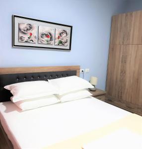 Кровать или кровати в номере Comfort Apartments