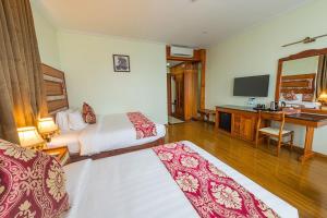 Kampong Thom Royal Hotel客房内的一张或多张床位
