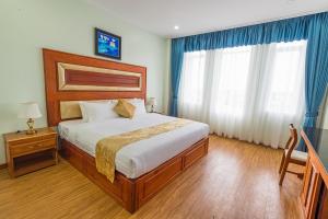 Kampong Thom Royal Hotel客房内的一张或多张床位