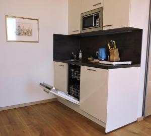 Kuchnia lub aneks kuchenny w obiekcie 211 Amsterdam, Studio Apartment, 30m2 1-4 Pers