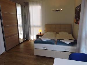 Łóżko lub łóżka w pokoju w obiekcie 211 Amsterdam, Studio Apartment, 30m2 1-4 Pers