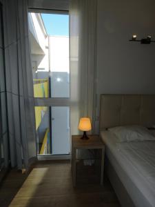 Łóżko lub łóżka w pokoju w obiekcie 211 Amsterdam, Studio Apartment, 30m2 1-4 Pers