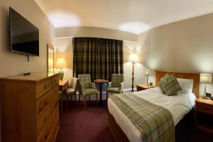 Postelja oz. postelje v sobi nastanitve Carnoustie Golf Hotel 'A Bespoke Hotel’