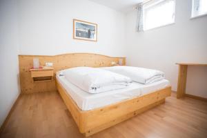 Postel nebo postele na pokoji v ubytování Residence Bergblick