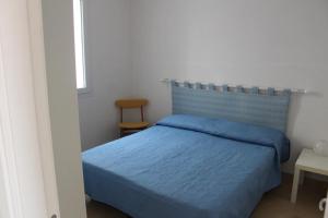 Postel nebo postele na pokoji v ubytování A casa di Mimì