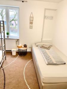 Cama ou camas em um quarto em New Hostel Berlin Mitte FREE SNACK hot tea and coffee