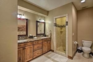 a bathroom with two sinks and a shower at Breck Mtn Home with Hot Tub and Game Room! in Breckenridge +30 photos