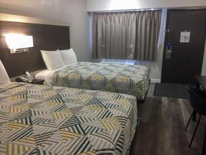 Кровать или кровати в номере Motel 6-Burnsville, MN