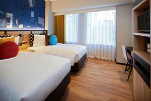 Letto o letti in una camera di Citadines Namba Osaka
