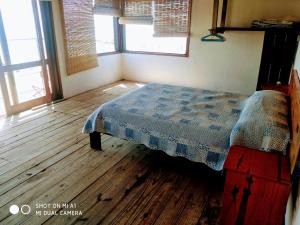 Postel nebo postele na pokoji v ubytování La Posada