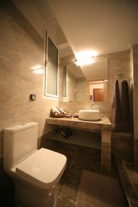 a bathroom with a white toilet and a sink at Denise Luxury Apartment-Centre of Athens,Kolonaki in Athens +16 photos