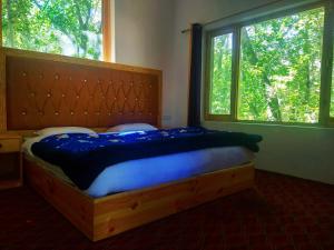 Een bed of bedden in een kamer bij Tushita Ladakh