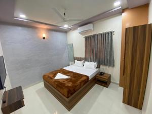 Postel nebo postele na pokoji v ubytování HOTEL DIVINE