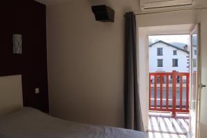Postel nebo postele na pokoji v ubytování Hotel Etchoinia