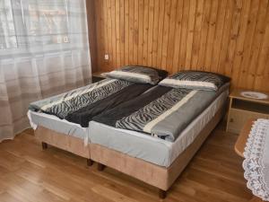 Posteľ alebo postele v izbe v ubytovaní U Wiesi