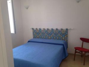 Postel nebo postele na pokoji v ubytování A casa di Mimì