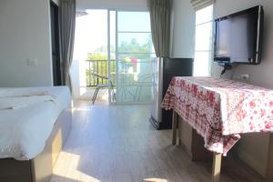 Postel nebo postele na pokoji v ubytování Plus Hotel