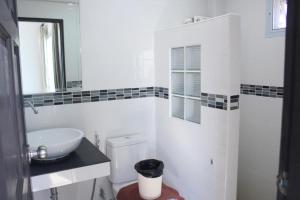 Koupelna v ubytování Plus Hotel