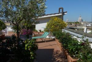 גינה חיצונית ב-Apartment Spanish Steps with panoramic roof-terrace