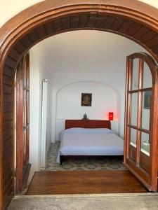 Säng eller sängar i ett rum på Villa Pina
