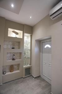 Kuchyň nebo kuchyňský kout v ubytování Olive Grove Deluxe apartment