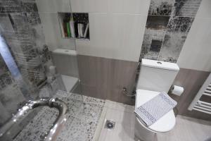 Koupelna v ubytování Olive Grove Deluxe apartment