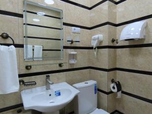 Ένα μπάνιο στο Primestay Samarkand Residences