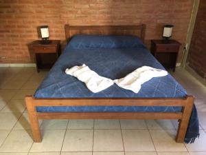 Postel nebo postele na pokoji v ubytování El Viejo Vagon + 9 fotografií