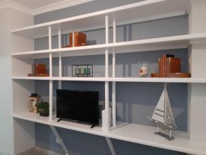 Televízia a/alebo spoločenská miestnosť v ubytovaní Trip Canteras, new Beach Apartment