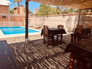 Bazén v ubytování El Viejo Vagon nebo v jeho okolí