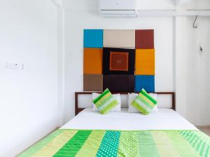 A bed or beds in a room at White Fortress
