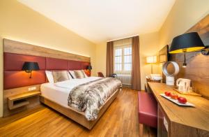 Das Gutenbrunn Thermen & Sporthotel客房内的一张或多张床位