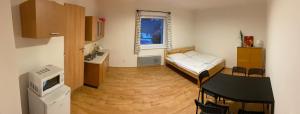 Kuchyň nebo kuchyňský kout v ubytování Apartmány Viktorka