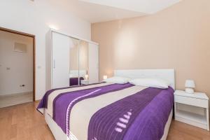 Posteľ alebo postele v izbe v ubytovaní Apartments Danijela 1
