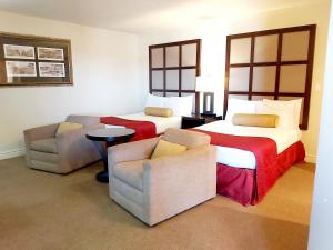 Postel nebo postele na pokoji v ubytování Seely's Motel