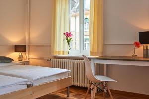 Ένα ή περισσότερα κρεβάτια σε δωμάτιο στο Saint Georges Hotel
