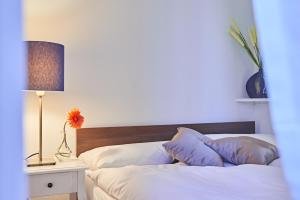 Ένα ή περισσότερα κρεβάτια σε δωμάτιο στο Saint Georges Hotel