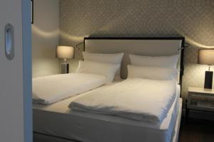 Voodi või voodid majutusasutuse Hotel Wemperhardt toas