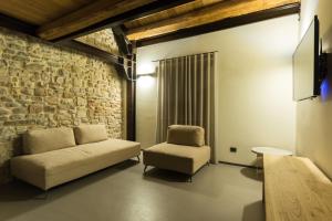 Uma área de estar em Borgotufi Albergo Diffuso