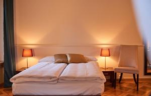 Ένα ή περισσότερα κρεβάτια σε δωμάτιο στο Saint Georges Hotel