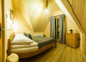 Posteľ alebo postele v izbe v ubytovaní Domek & Apartament Góralski z Jacuzzi Kościelisko