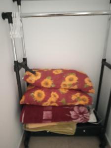 a towel rack with three pillows on it at Casa Altavista in Vilaflor