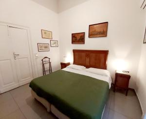 Postel nebo postele na pokoji v ubytování B&B Platamon