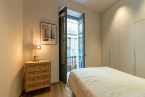 Posteľ alebo postele v izbe v ubytovaní Balmis Plaza Apartments