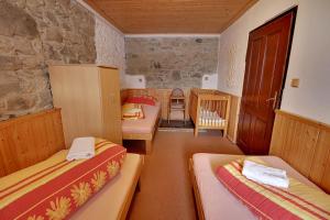 Postel nebo postele na pokoji v ubytování Chalupa Chlum Míša + 41 fotografií