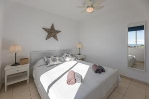 Postel nebo postele na pokoji v ubytování Casa Sol de Jandía + 14 fotografií