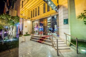 a building with stairs in front of a building at Al Muhaidb Al Malaz - Al Jamiah in Riyadh