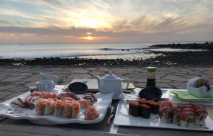 a table with food and a view of the ocean at Dream View in Adeje