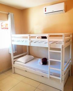 Katil atau katil-katil dalam bilik di Golden Apartament's Porto de Galinhas +62 gambar