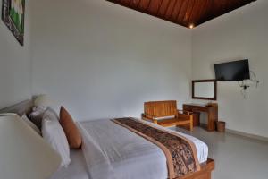 Кровать или кровати в номере Arya Resort Nusa Penida